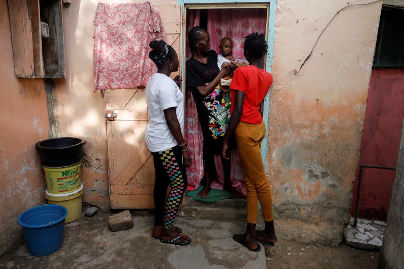 Wider Image: Meet Senegal's first female pro surfer inspiring girls to take to the waves