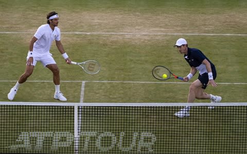 Andy Murray made a victorious return in the doubles at Queen's - Credit: Getty Images