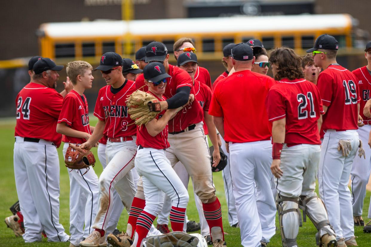 John Glenn players celebrate during the regional semifinal baseball game Saturday, June 4, 2022 at Griffith High School. 