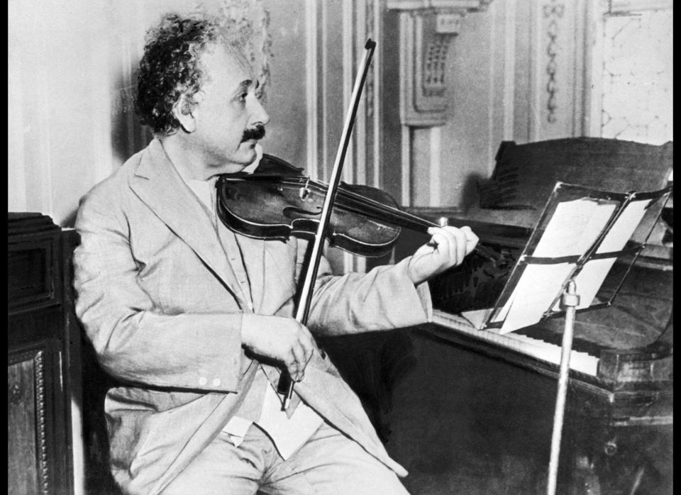 PRINCETON, UNITED STATES:  (FILES) Picture taken in Princeton in 1931 of German-born Swiss-US physicist Albert Einstein (1879-1955), author of theory of relativity, awarded the Nobel Prize for Physics in 1921, playing the violin. Germany, the birthplace of Albert Einstein, launches 19 January 2005 a year of international celebrations to mark the 100th anniversary of three of the physicist's four papers that changed the way we view the Universe. AFP PHOTO/FILES  (Photo credit should read -/AFP/Getty Images)