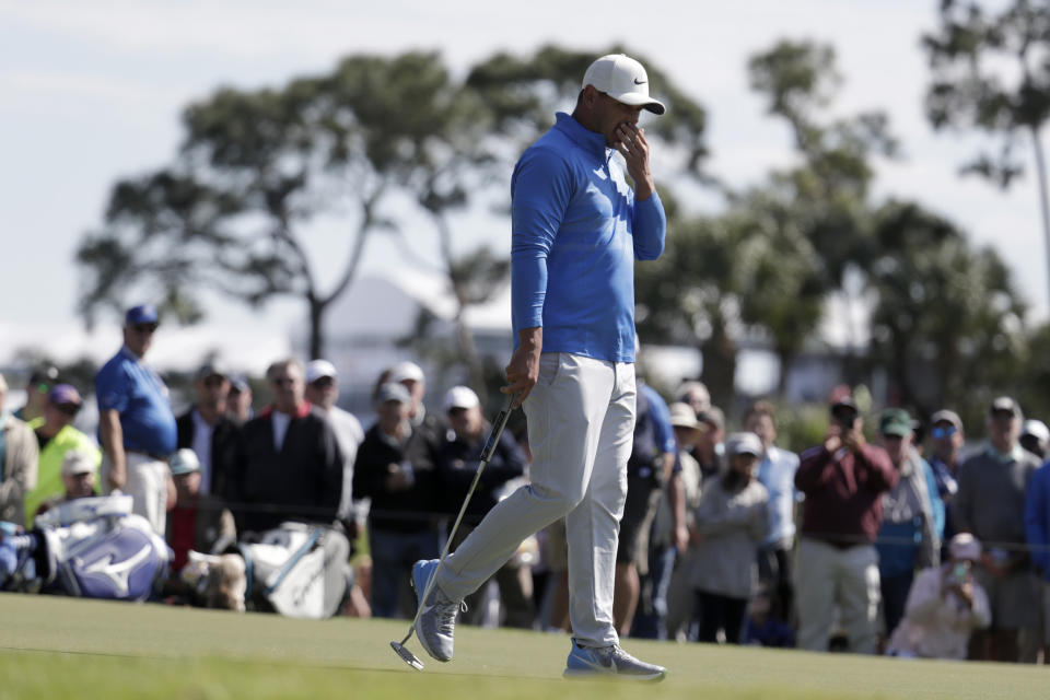 Brooks Koepka reacts after missing a putt on the eighth hole during the first round of the Honda Classic golf tournament, Thursday, Feb. 27, 2020, in Palm Beach Gardens, Fla. (AP Photo/Lynne Sladky)