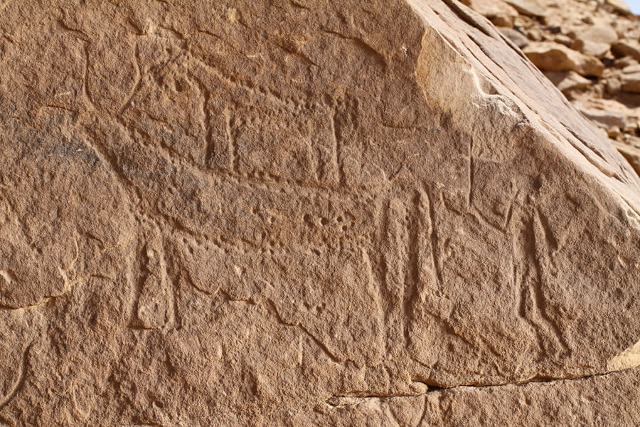 A dog perches on the back of a cow, with a stick-wielding herder behind. (Stan Hendrickx, John Coleman Darnell & Maria Carmela Gatto) <br> <a href="http://www.livescience.com/25359-photos-first-egypt-pharaoh-carvings.html" rel="nofollow noopener" target="_blank" data-ylk="slk:Click here to see the full collection at LiveScience.com;elm:context_link;itc:0;sec:content-canvas" class="link ">Click here to see the full collection at LiveScience.com</a>