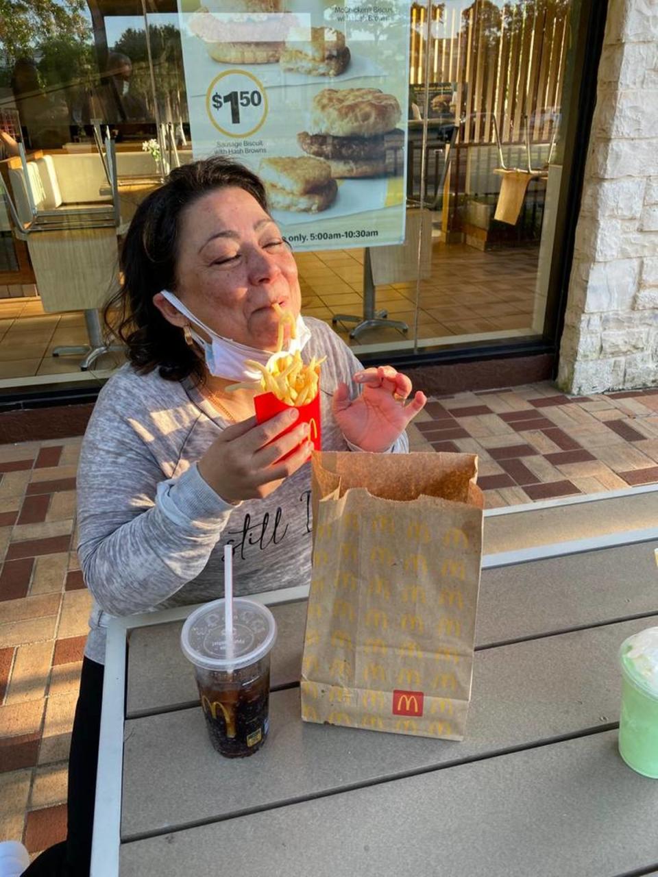 After being released from a federal prison in Tallahassee on April 1, Evelyn Bozon Pappa enjoys a meal at McDonald’s with a few supporters who helped the Colombian woman gain her freedom. Bozon, 59, had been serving a life sentence for drug trafficking.