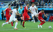 Soccer Football - World Cup - Group E - Serbia vs Switzerland - Kaliningrad Stadium, Kaliningrad, Russia - June 22, 2018 Switzerland's Xherdan Shaqiri in action with Serbia's Nemanja Matic and Dusko Tosic REUTERS/Mariana Bazo