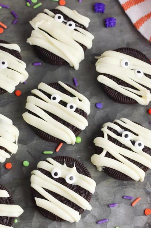 <p>Kimspired DIY</p><p><strong>Get the recipe: <a href="https://kimspireddiy.com/halloween-mummy-cookies-best-mummy-oreo-cookie-recipe-easy-oreo-cookie-mummies-party-food-desserts-snacks/" rel="nofollow noopener" target="_blank" data-ylk="slk:Mummy Halloween Oreo Cookies;elm:context_link;itc:0;sec:content-canvas" class="link ">Mummy Halloween Oreo Cookies</a></strong></p>