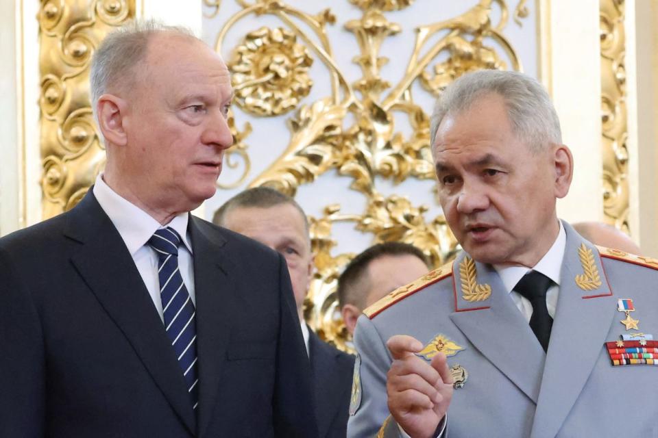 Then-Russia's Defence Minister Sergei Shoigu (R) and Russia's Secretary of the Security Council Nikolai Patrushev (L) attend President Vladimir Putin's inauguration ceremony at the Kremlin in Moscow, Russia, on May 7, 2024. (Vyacheslav Prokofyev/POOL/AFP via Getty Images)