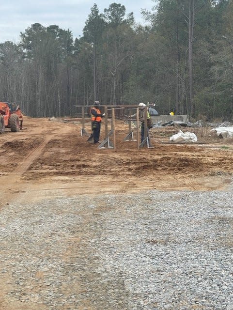 Construction crews are seen working on the Effingham Parkway.