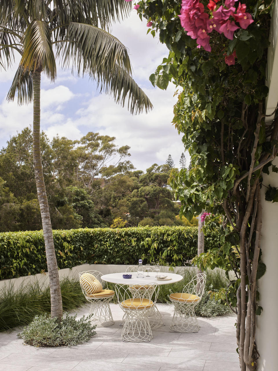 Oudoor dining area on a terrace with small round table