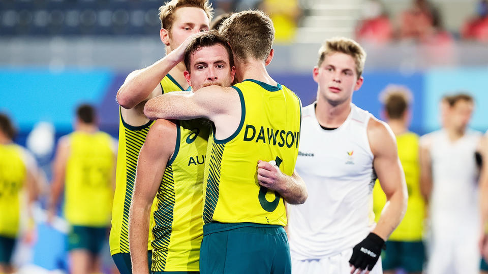 Jacob Whetton and Matthew Dawson, pictured here consoling each other after the Hockeyroos&#39; loss to Belgium. 