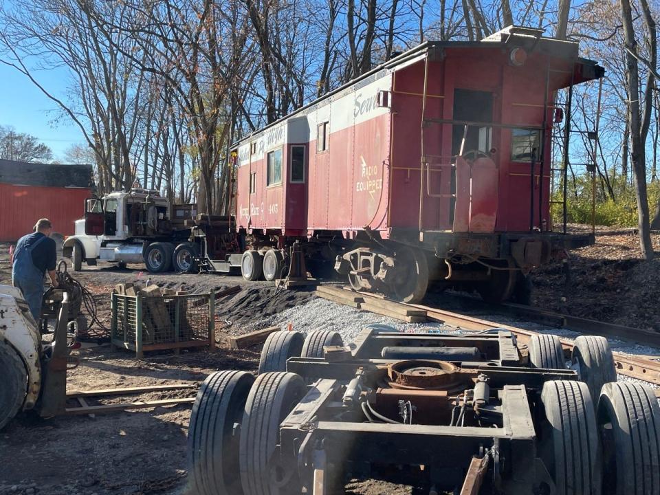 The red Nickel Plate Road caboose on a trailer