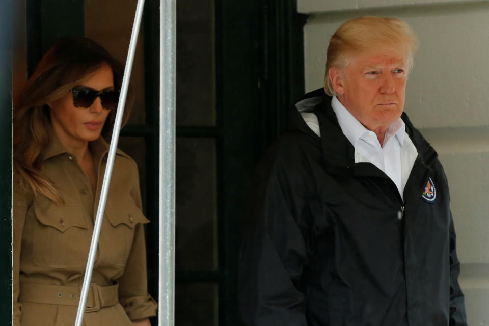 <p>President Donald Trump and first lady Melania Trump walk out from the White House in Washington before their departure to view storm damage in Texas, Sept. 2, 2017. (Photo: Yuri Gripas/Reuters) </p>