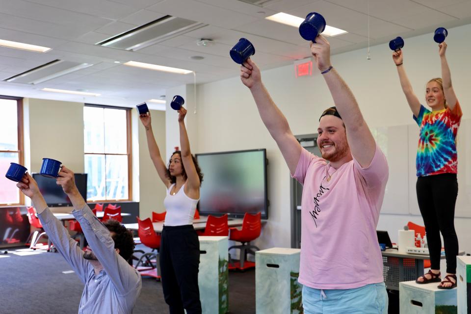 “Water Rocks!: The Musical” cast members rehearse a scene in preparation for the show's premiere.