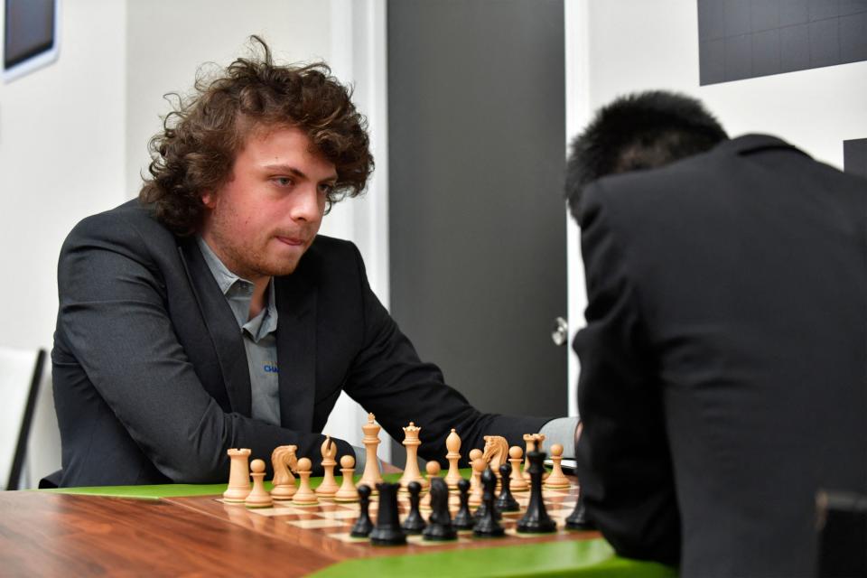 Hans Niemann waits his turn to move during a second-round chess game against Jeffery Xiong on the second day of the Saint Louis Chess Club Fall Chess Classic in St. Louis, Missouri, on Oct. 6, 2022.