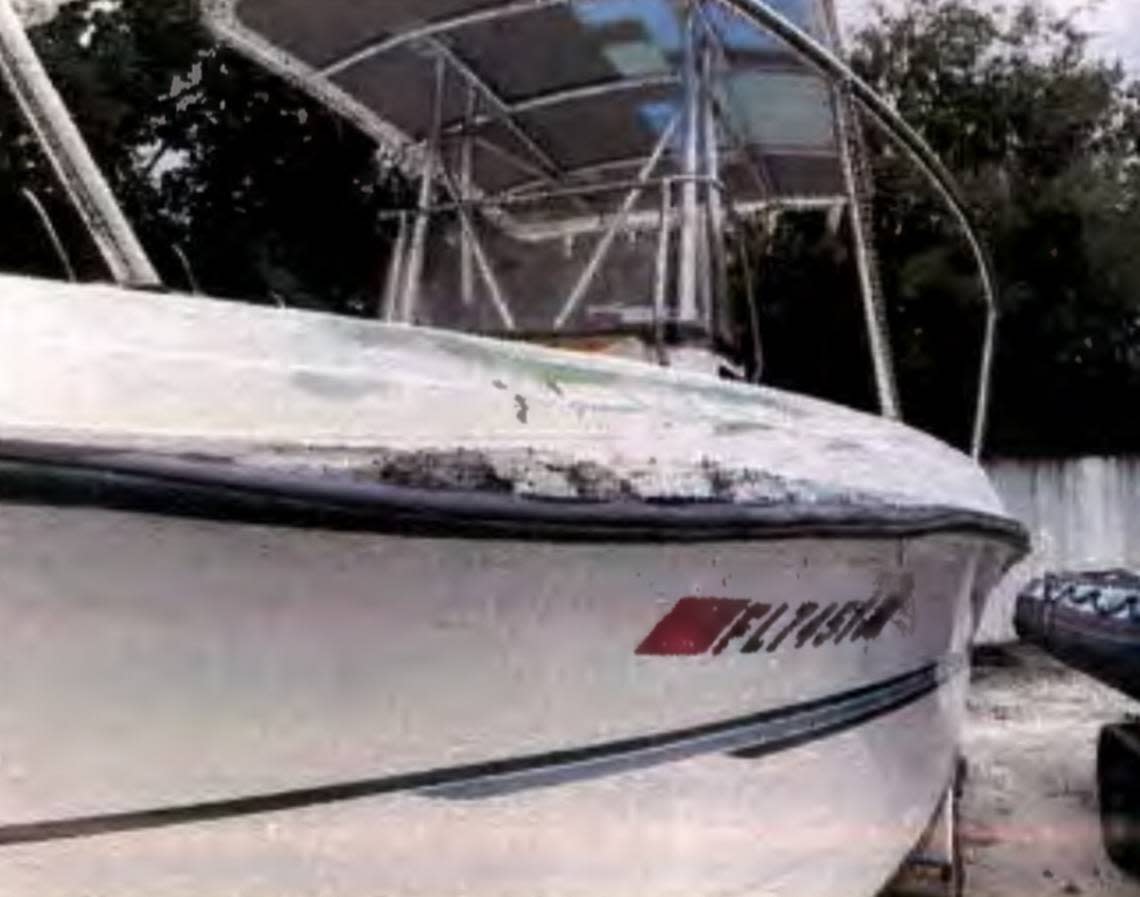 A Florida Fish and Wildlife Conservation Commission photograph shows damage on the left side of a boat that struck a navigational marker off Key West on Oct. 6, 2023. The crash killed a 46-year-old woman.