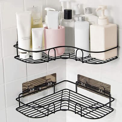 *Finally* tackle the Bottle Graveyard of Showers Past with the help of this self-adhesive corner shower caddy. It's 39% off!