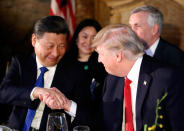 <p>President Donald Trump, right, shakes hands with Chinese President Xi Jinping during a dinner at Mar-a-Lago, Thursday, April 6, 2017, in Palm Beach, Fla. (Photo: Alex Brandon/AP) </p>