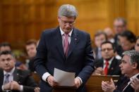 Prime Minister Stephen Harper delivers condolences to all citizens of South Africa and the Mandela family, on behalf of the Government of Canada in the House of Commons on Parliament Hill in Ottawa on Thursday, Oct. 5, 2013. THE CANADIAN PRESS/Sean Kilpatrick