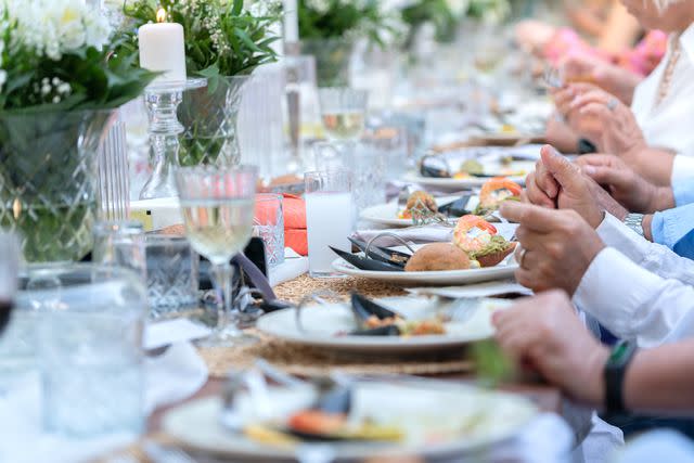 <p>Getty</p> A stock image of a wedding reception meal