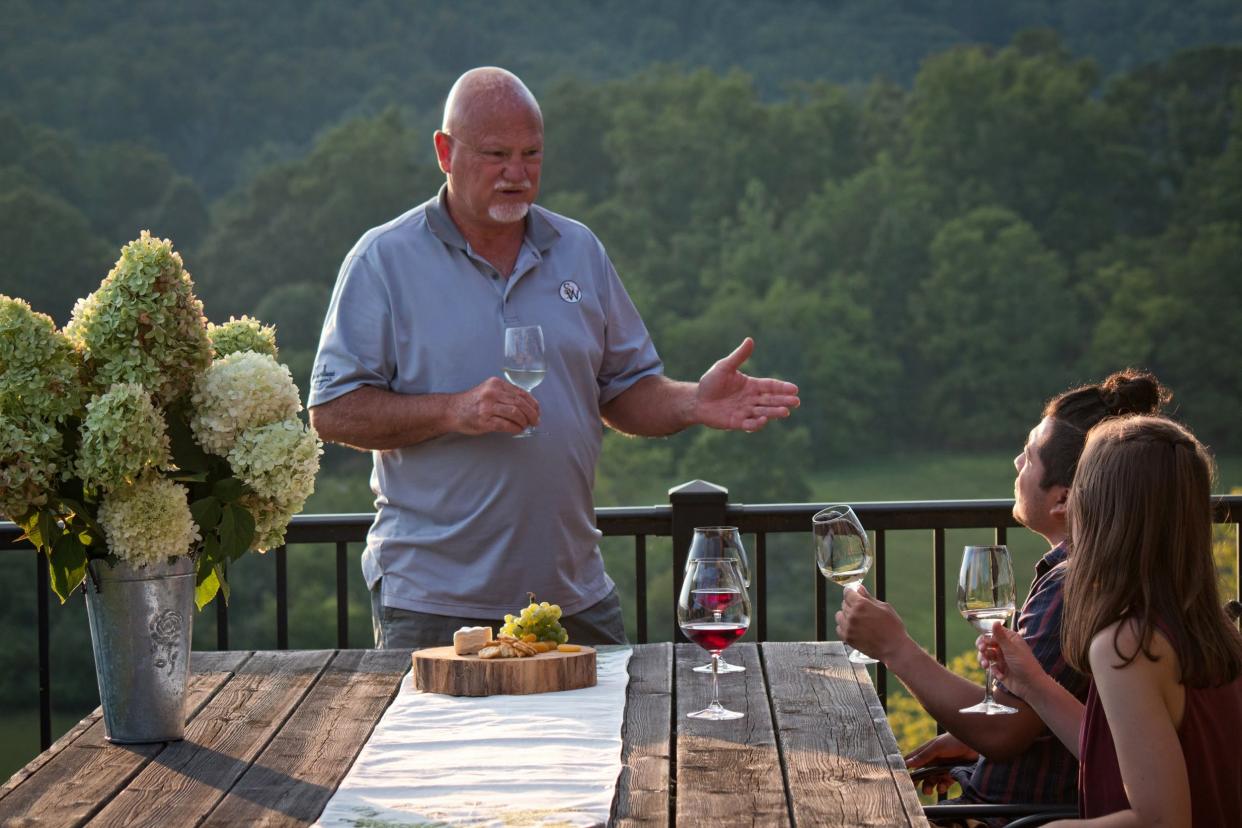 Kenneth Parker, owner of Souther Williams, talks about his wines to some guests.