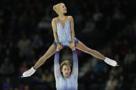 Nica Digerness and Danny Neudecker perform during the pair's free skating program at Skate America, Saturday, Oct. 20, 2018, in Everett, Wash. (Olivia Vanni/The Herald via AP)