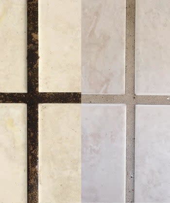 Reviewer's up-close picture of dirty grout next to clean grout