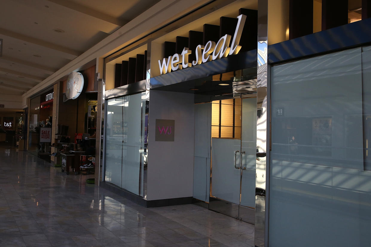 SAN FRANCISCO, CA - JANUARY 07:  Paper covers the windows at a closed Wet Seal store on January 7, 2015 in San Francisco, California. Wet Seal, a teen clothing retailer, announced that it has closed 338 of its retail stores and will lay off nearly 3,700 employees.  (Photo by Justin Sullivan/Getty Images)