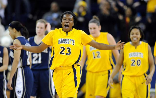 Marquette's Tatiyiana McMorris celebrates in the closing seconds of Marquette's 75-65 victory over No. 10 Notre Dame in an NCAA college basketball game Tuesday, Jan. 13, 2009, in Milwaukee.