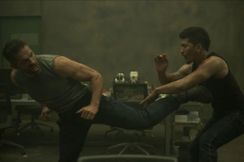 Scott Adkins (L) kicks Iko Uwais in "Skyline: Warpath." Photo courtesy of XYZ Films