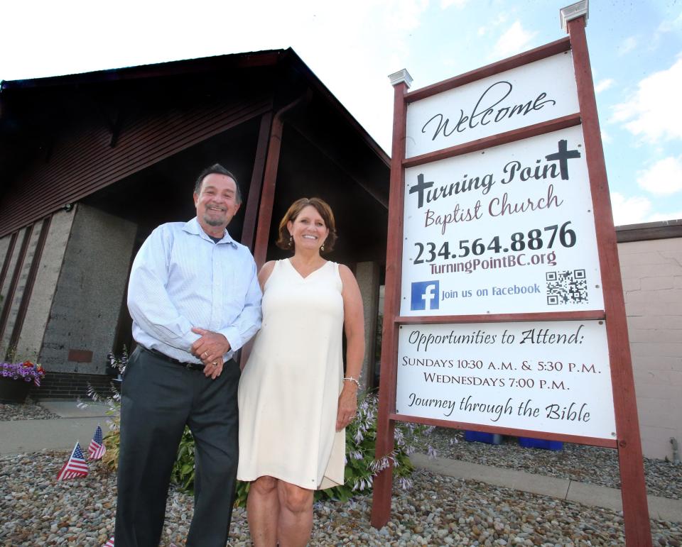 Rev. Ron Lanham and his wife, Sherry, outside on the Turning Point Baptist Church in the Limaville area of Lexington Township.