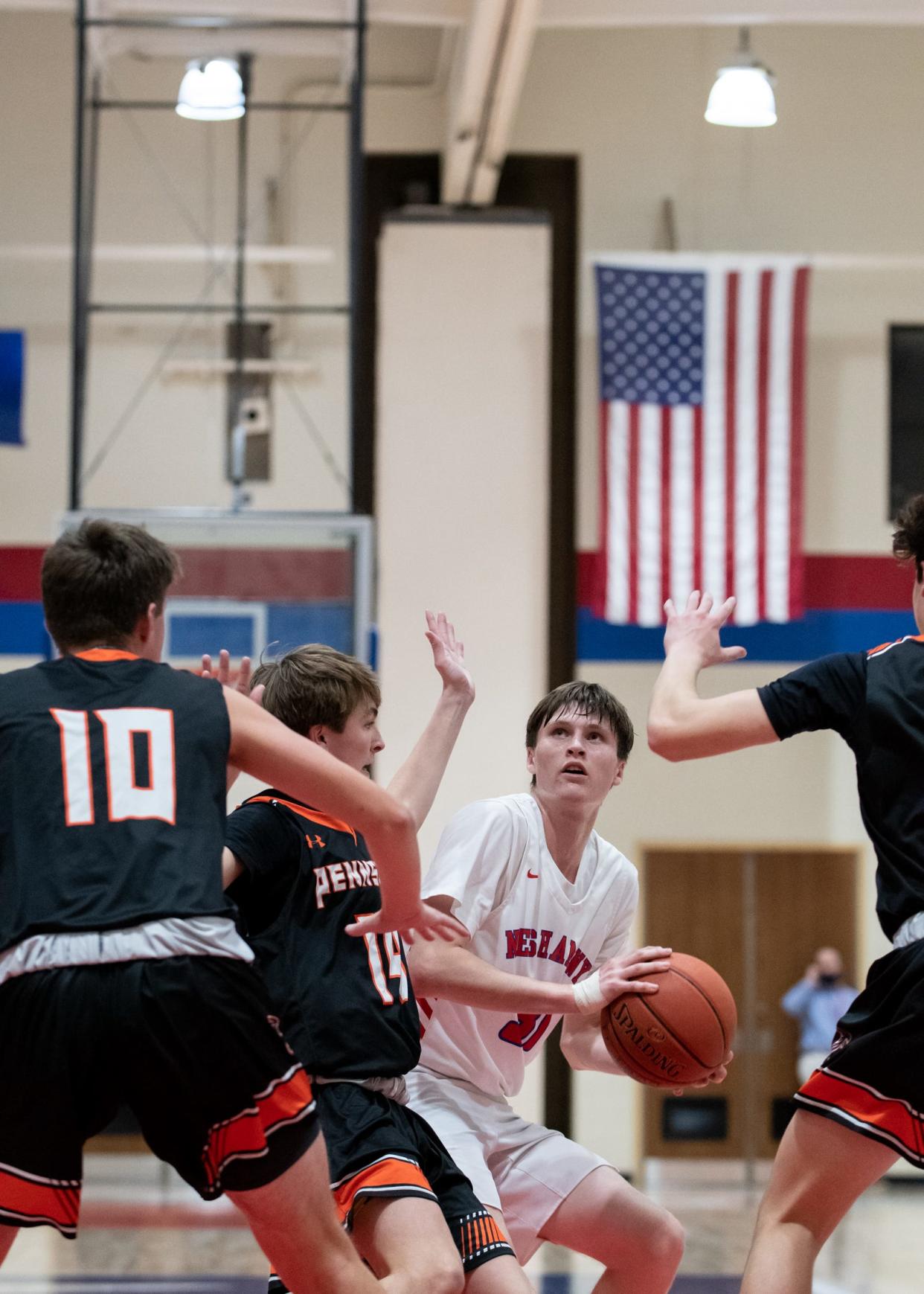 Neshaminy's Sean Curley eyes the basket before shooting in a game last season.