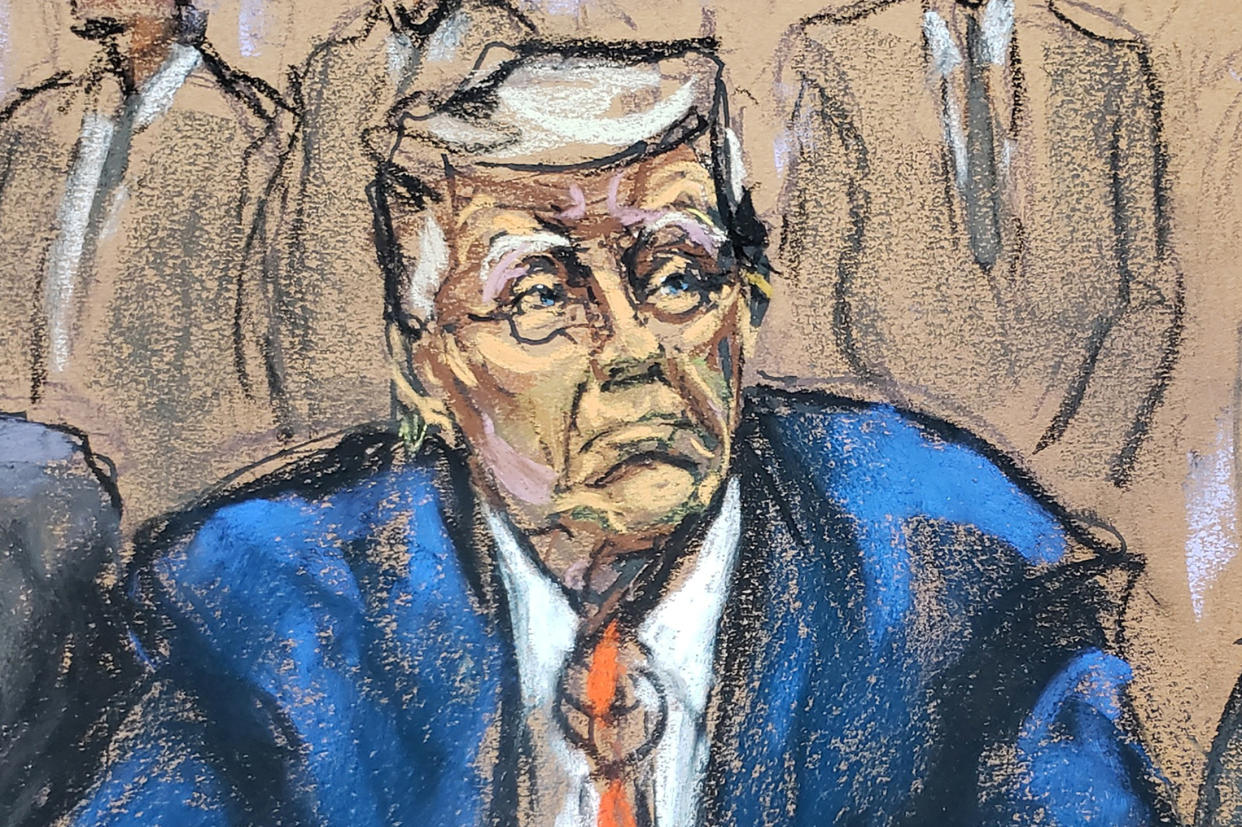 Former President Donald Trump is arraigned on criminal charges inside federal court in Washington, D.C., on Aug. 3, as shown in a courtroom sketch. 