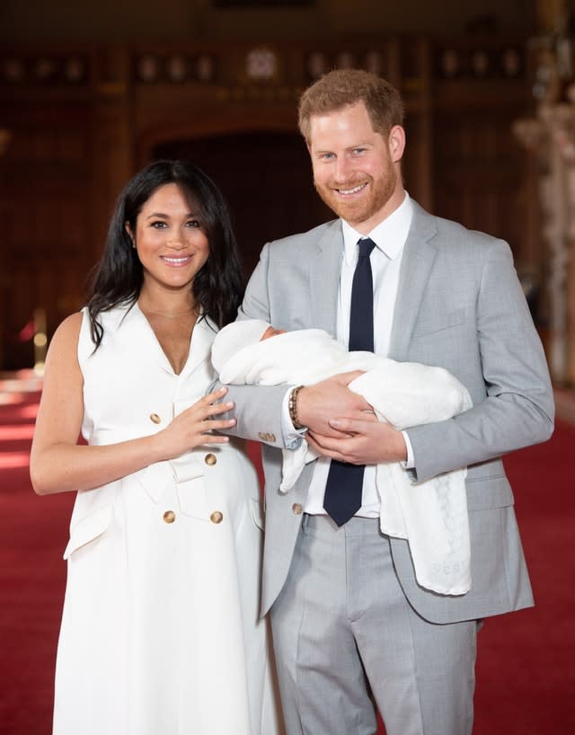 Harry and Meghan with their newborn son Archie