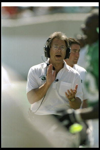 Michigan State Spartans head coach Nick Saban looks on during a game against the Nebraska Cornhuskers in 1995 at Spartan Stadium. Nebraska won the game, 50-10.