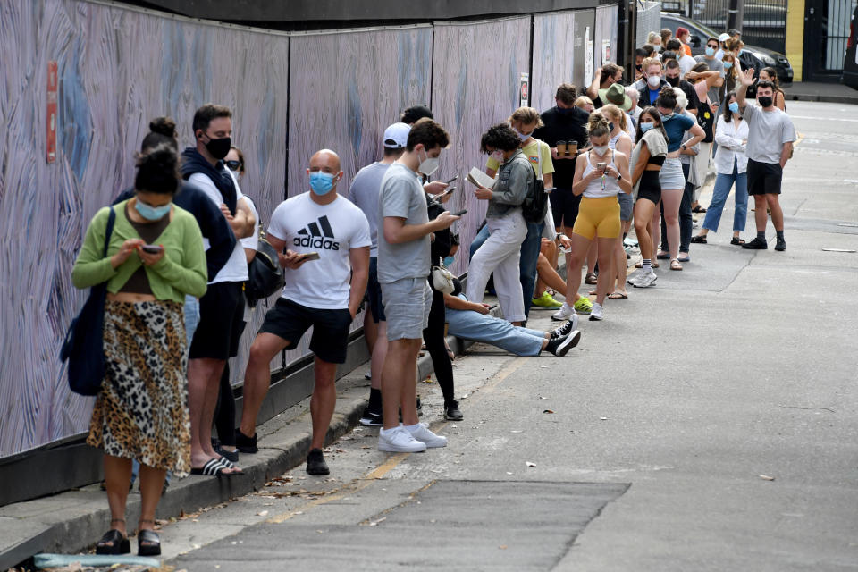 People line up for hours at Covid testing site.