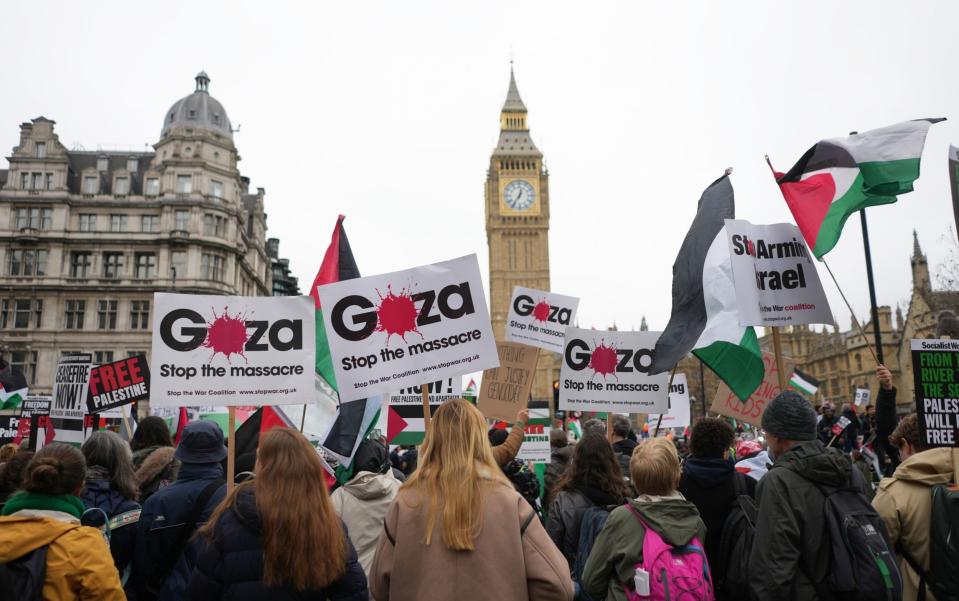 People gather in Parliament Square ahead of a pro-Palestine march