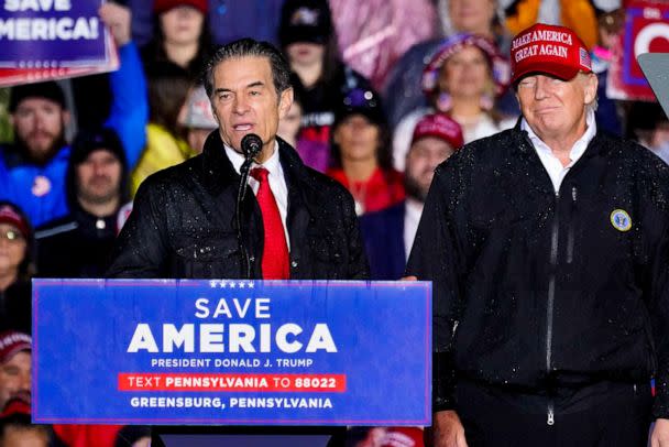 PHOTO: Pennsylvania Senate candidate Dr. Mehmet Oz, accompanied by former President Donald Trump, speaks at a campaign rally in Greensburg, Pa., May 6, 2022. (Gene J. Puskar/AP, FILE)