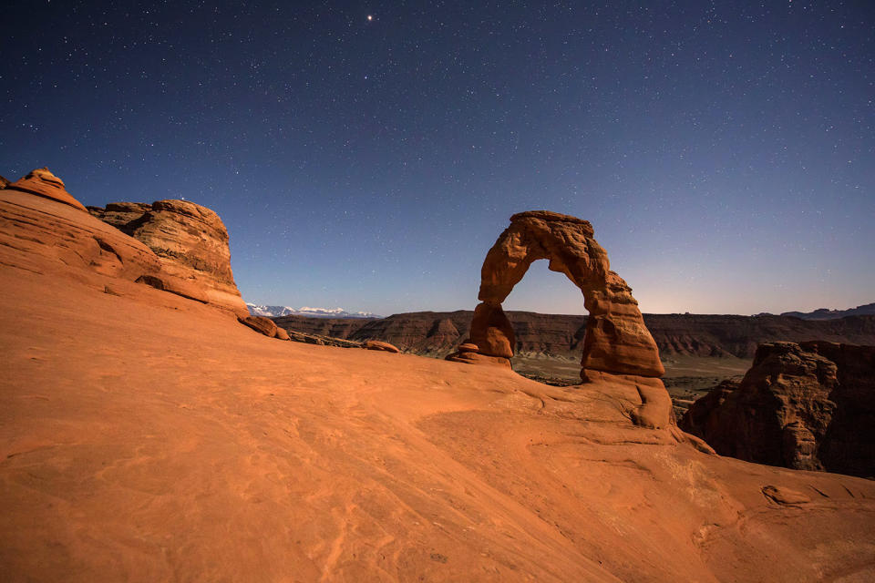 <p>The pictures show natural, freestanding red rock formations against the Milky Way. (Photo: Brad Goldpaint/Caters News) </p>