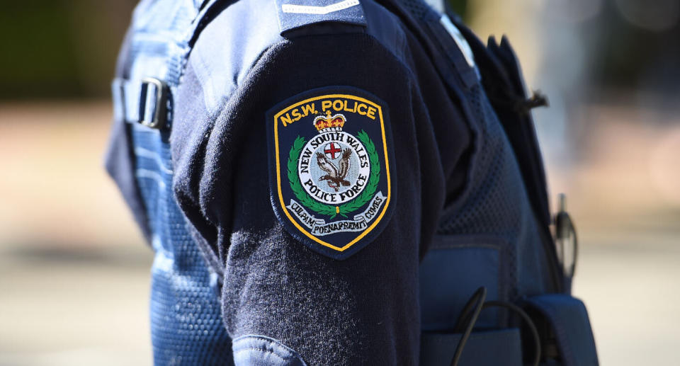 A stock image of a NSW Police badge. A 17-year-old has been shot in the arm near the intersection of Woodhouse Drive and Jaggers Place, Ambarvale on Saturday morning. Police are now investigating.