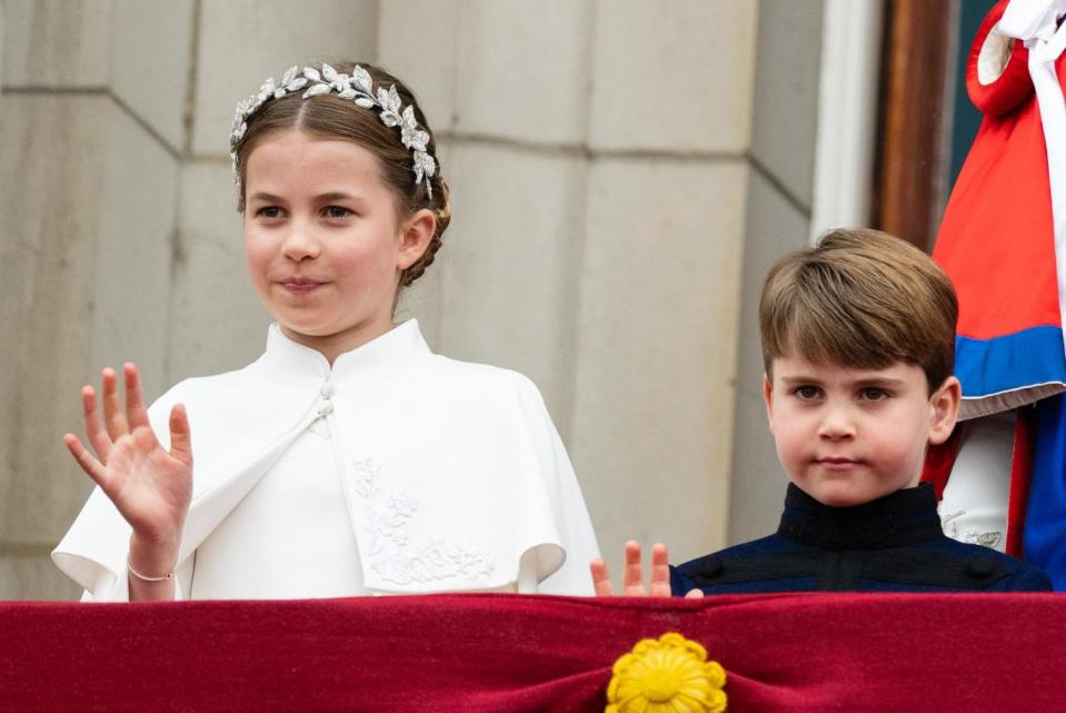 PHOTO: Princess Charlotte of Wales and Prince Louis of Wales on the balcony of Buckingham Palace following the Coronation of King Charles III and Queen Camilla, May 6, 2023, in London. (Samir Hussein/Pool/WireImage/Getty Images)