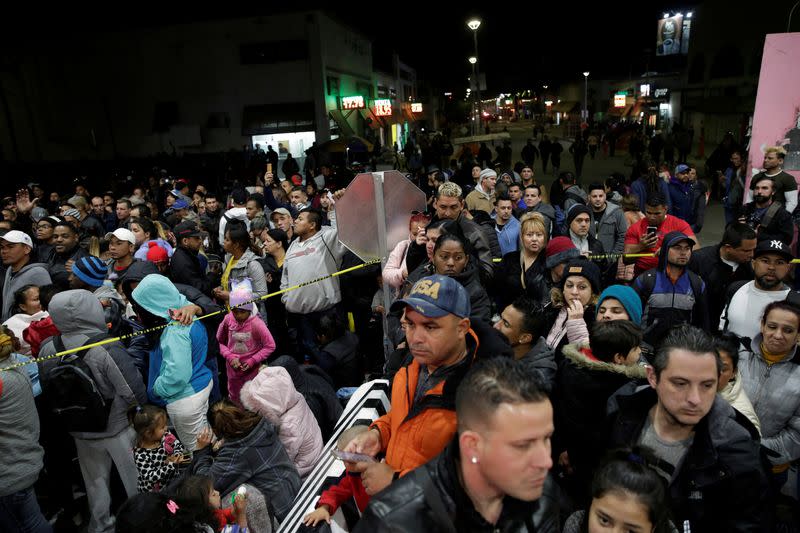 Migrants, mainly from Cuba, block the Paso del Norte border crossing bridge after a U.S. appeals court blocked the Migrant Protection Protocols (MPP) program, in Ciudad Juarez