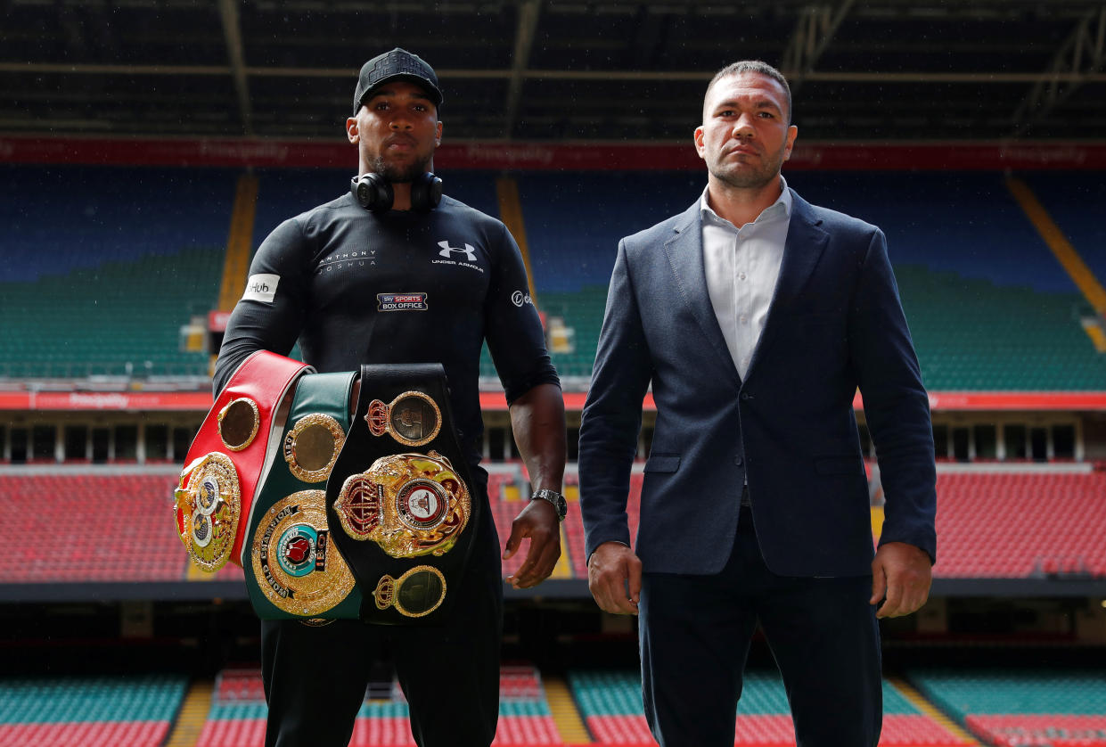 Boxing - Anthony Joshua and Kubrat Pulev Press Conference - Cardiff, Britain - September 11, 2017   Anthony Joshua and Kubrat Pulev pose after the press conference    Action Images via Reuters/Andrew Couldridge
