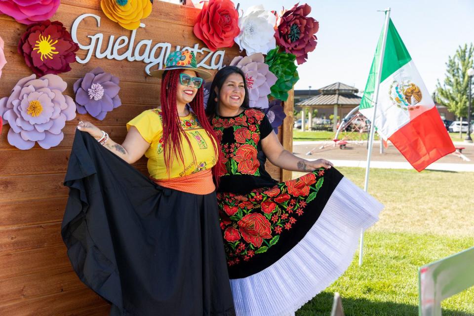 Left to right, Paloma Jensen and Lizette Villegas have their photo taken at La Guelaguetza at Heritage Park in Kaysville on Saturday.