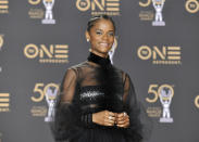 Letitia Wright, winner of the award for outstanding breakthrough performance in a motion picture for "Black Panther," poses in the press room at the 50th annual NAACP Image Awards on Saturday, March 30, 2019, at the Dolby Theatre in Los Angeles. (Photo by Richard Shotwell/Invision/AP)