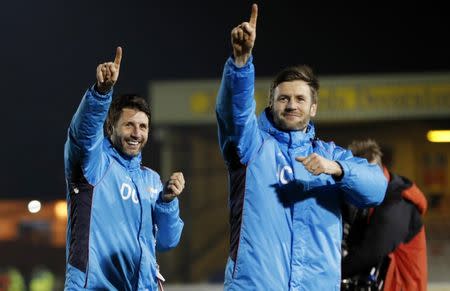 Britain Football Soccer - Lincoln City v Ipswich Town - FA Cup Third Round Replay - Sincil Bank - 17/1/17 Lincoln City manager Danny Cowley celebrates after the match with assistant manager Nicky Cowley Reuters / Darren Staples Livepic