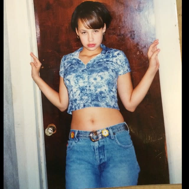 Amber Rose didn't always look like the bootylicious babe we all know and love! The 32-year-old model recently took to Instagram to share a super-cute throwback pic of herself, sporting an adorable ‘90s look, including a cropped floral shirt and light-wash jeans. Perhaps most noticeable are her sideswept bangs, a big change from her now signature shaved head. "Young Ambs," she captioned the pic. <strong>PHOTOS: Diane Kruger Was Still Gorgeous at 15 Years Old</strong> Compare the snapshot to her recent appearance at a Memorial Day party at Chateau nightclub in Las Vegas on May 22 -- where Kanye West's ex showed off her tattoos and bleached eyebrows -- and it's safe to say you probably wouldn't recognize Amber from her throwback! Splash News Earlier this month, Amber appeared on E!'s <em>Good Work</em>, where she wasn't shy about revealing her jaw-dropping bra size. "I wear a 36H, natural," she said. <strong>WATCH: Amber Rose Opens Up to ET About Her Infamous Khloe Kardashian Feud</strong> Watch below: