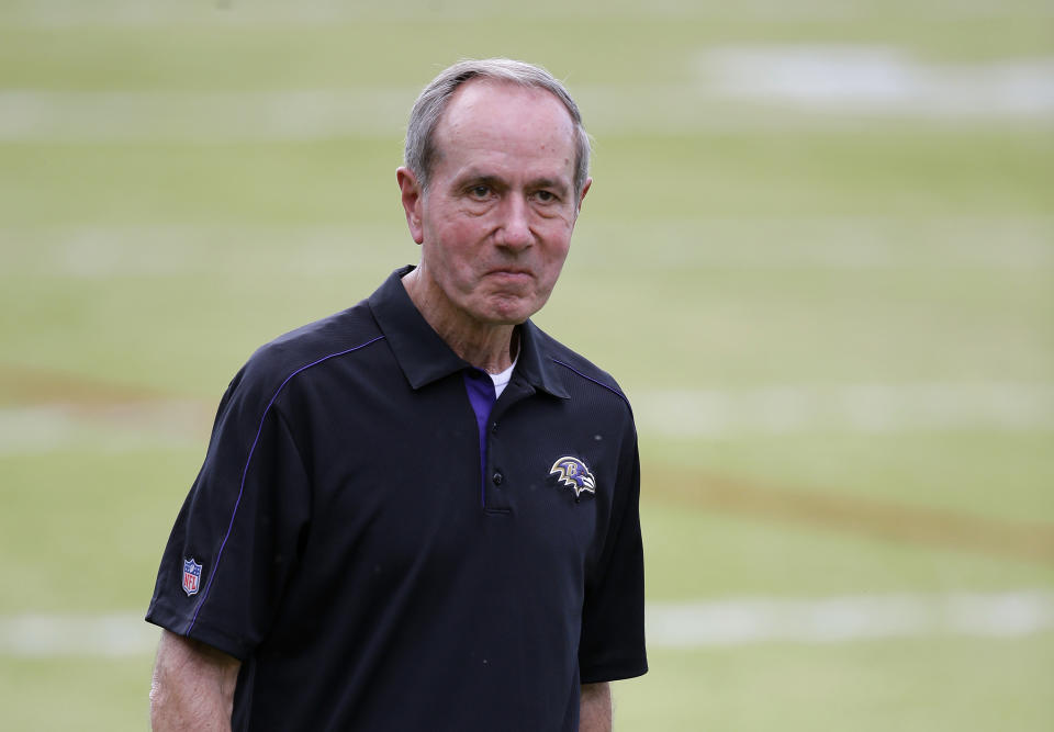 FILE - In this Aug. 1, 2015, file photo, Baltimore Ravens president Dick Cass walks off the field after NFL football training camp practice in Owings Mills, Md. At a time when America is trying to cope with the financial fallout created by the deadly coronavirus, the renewal of NFL season tickets is not exactly a high priority in the midst of soaring unemployment, business closures and a volatile stock market. “There’s a lot of people who are being incredibly affected by this crisis and may not have the funds available to complete the purchase of their season tickets," Ravens president Dick Cass said. “We’re dealing with a lot of season ticket holders who have been with us for 20 years and we don’t want to lose them. So we’re going to work with them, and hopefully we can find a solution that works for everybody."(AP Photo/Patrick Semansky, File)