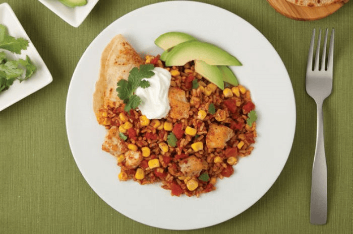 <p>It’s hard to replicate the zest and bold flavors of restaurant Tex-Mex, but this dish comes about as close as you can get. Canned tomatoes and corn play off each other in the salty and mildly sweet Southwestern dish.</p><p><a href="http://www.thedailymeal.com/ranchero-chicken-rice/" rel="nofollow noopener" target="_blank" data-ylk="slk:For the Ranchero Chicken & Rice recipe, click here.;elm:context_link;itc:0;sec:content-canvas" class="link "><strong>For the Ranchero Chicken & Rice recipe, click here.</strong></a></p>