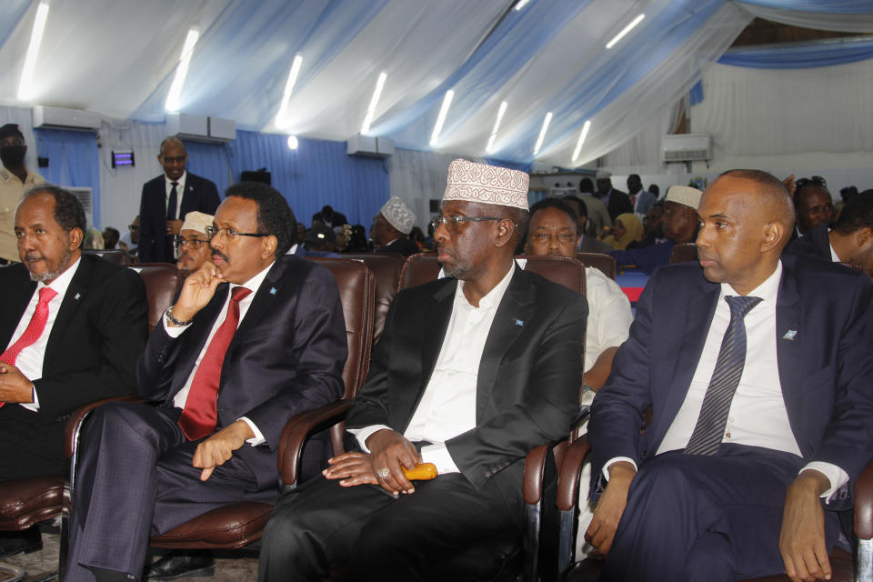 From left to right, former president Hassan Sheikh Mohamud, incumbent leader Mohamed Abdullahi Mohamed, former president Sharif Sheikh Ahmed, and former prime minister Hassan Ali Khaire, attend a voting session for the presidential election, at the Halane military camp which is protected by African Union peacekeepers, in Mogadishu, Somalia Sunday, May 15, 2022. Legislators in Somalia are meeting Sunday to elect the country's president in the capital, Mogadishu, which is under lockdown measures aimed at preventing deadly militant attacks. (AP Photo/Farah Abdi Warsameh)