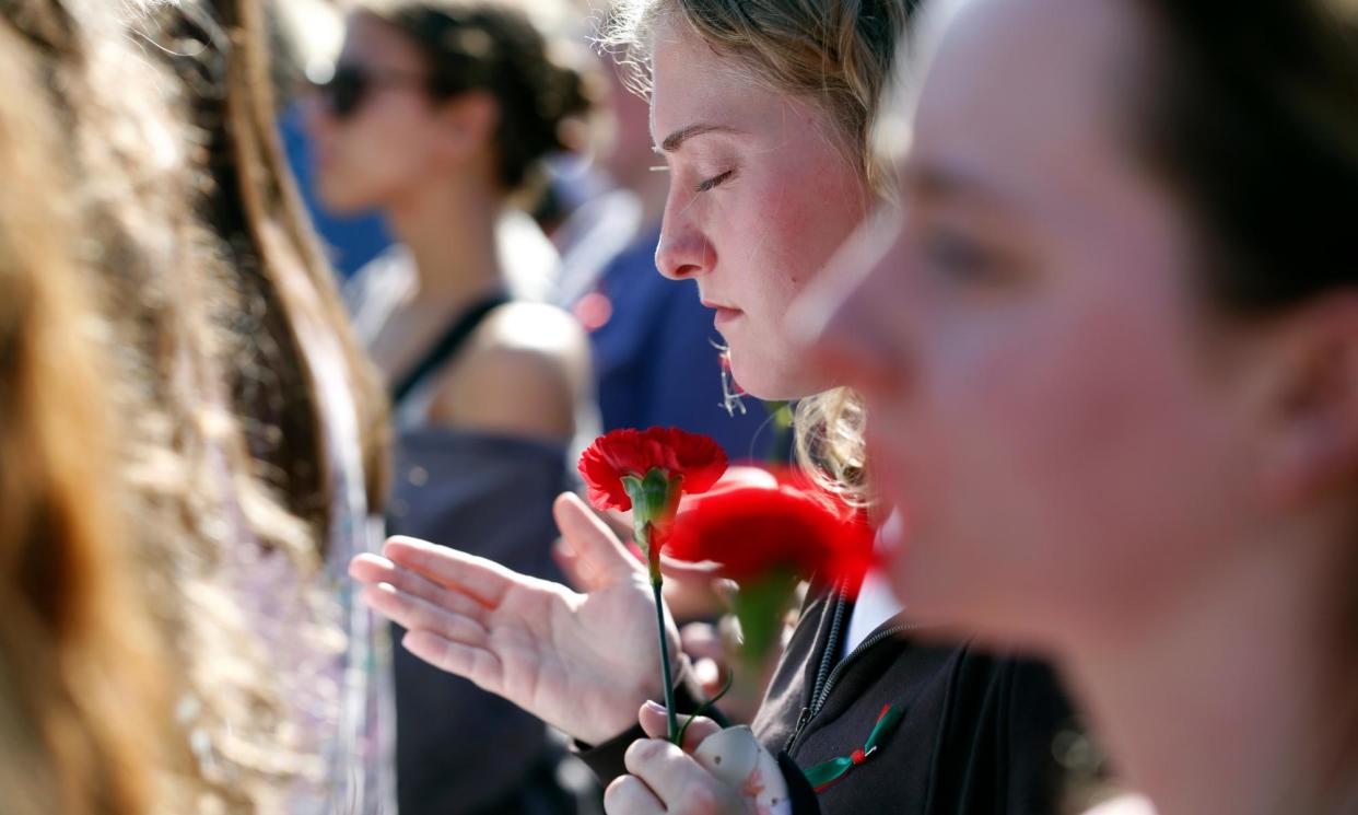 <span>A memorial to Laken Riley on campus at Augusta University in Georgia in February.</span><span>Photograph: Joshua L Jones/AP</span>