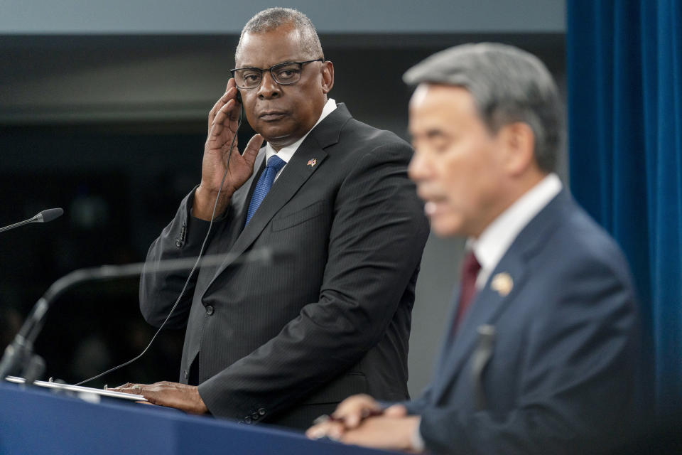 Secretary of Defense Lloyd Austin listens as South Korea's Minister of National Defense Lee Jong-sup, right, speaks in a joint news conference at the Pentagon, Thursday,Nov. 3, 2022, in Washington. (AP Photo/Andrew Harnik)